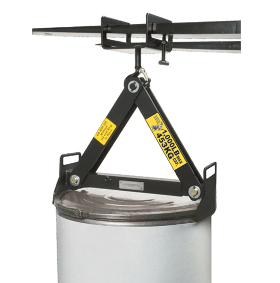 Drum Lifter picking up a fiber drum